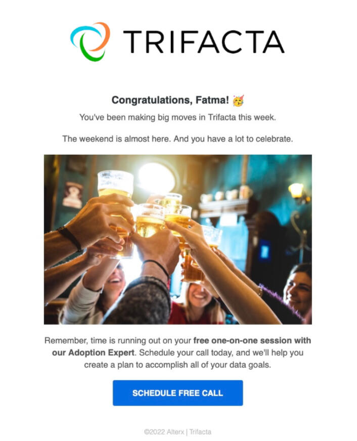 This image is of an email sent to users who had engaged in activity in product during the campaign but did not run a workflow. It features an image of people holding up their glasses, cheers-ing.